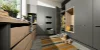 Locale lavanderia con armadi grigi e soluzioni di stoccaggio, Nolte Utility Rooms.