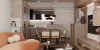Soggiorno moderno con zona pranzo in legno, arredato con stile. Nolte Living.