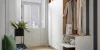 Ingresso elegante con guardaroba, panca e decorazioni, perfetto per Nolte Living.