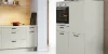 Cucina moderna e luminosa con elettrodomestici integrati e accenti in legno, ideale per Nolte Kitchen.