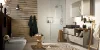 Modern bathroom with shower and sink by Nolte SPA.