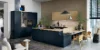 Cucina moderna con armadi scuri e accenti in legno, design di Nolte Kitchen.