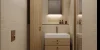 Bagno moderno con accenti in legno, lavabo e specchio; Design Nolte SPA.