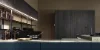 Cucina moderna con armadi scuri ed elementi minimalisti di Nolte Kitchen.
