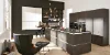 Cucina moderna con isola e sedia di design, progettata da Nolte Kitchen.