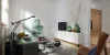 Un moderno soggiorno con mobili e decorazioni eleganti, Nolte Living.
