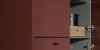 Elegante cucina aperta con ante rosse e moderne scatole di stoccaggio. Nolte Kitchen.