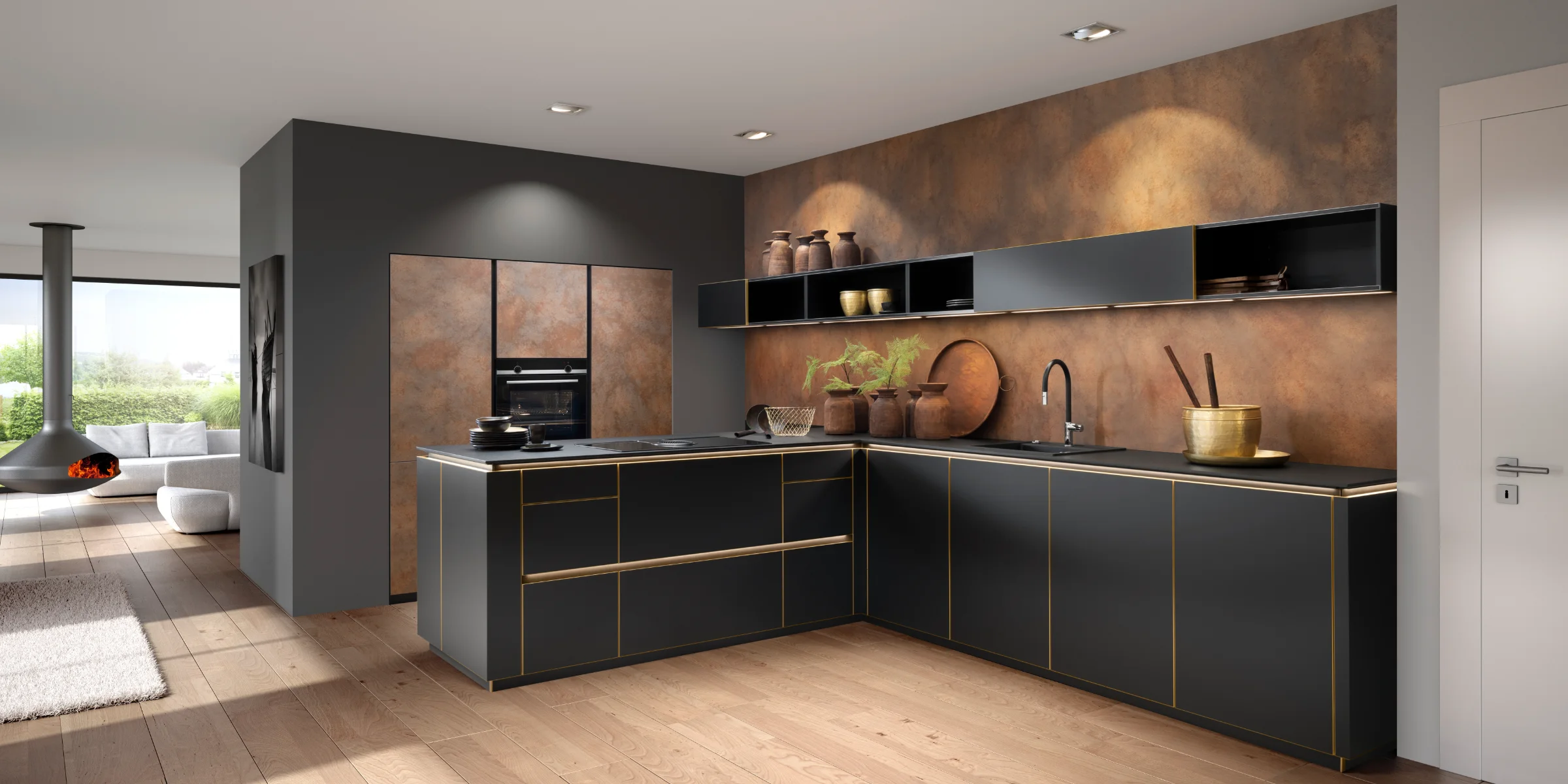 Moderna cucina Nolte con le ante FLAIR in nero con effetto ottone e FERRO in acciaio Corten. La combinazione di eleganza scura e superficie dall'aspetto industriale conferisce alla cucina un carattere lussuoso e urbano. Linee di accento color ottone sottolineano il design senza maniglie e aggiungono eleganti dettagli davanti alla decorazione murale dai toni caldi con effetto ruggine.