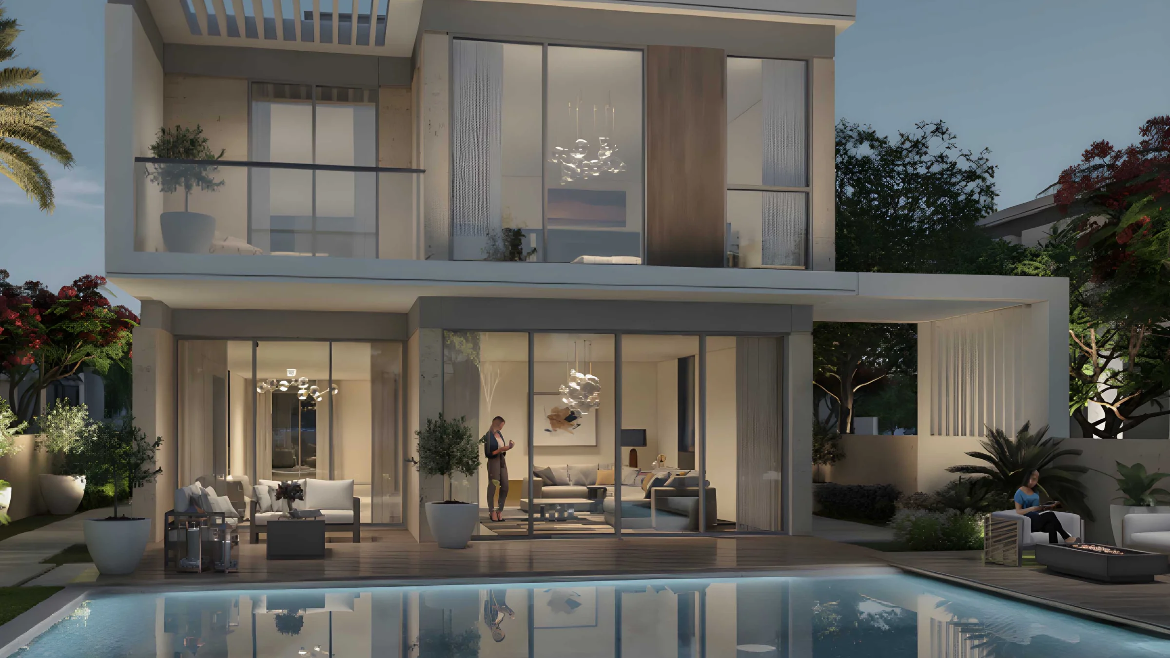 Casa moderna a due piani con ampia facciata in vetro e piscina in primo piano al crepuscolo.