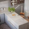 Cucina moderna con isola centrale e due sgabelli da bar, design di Nolte Kitchen.