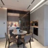 Cucina moderna con tavolo rotondo e quattro sedie, design Nolte sullo sfondo.