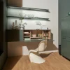 Un elegante spazio di lavoro con armadio e scaffale verde di Nolte Living.