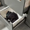 Un armadio aperto con cesti della biancheria in una lavanderia di Nolte Utility Rooms.