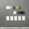 Campioni di colore e frontali di porte su una parete grigia in un design moderno, NolteNeo.