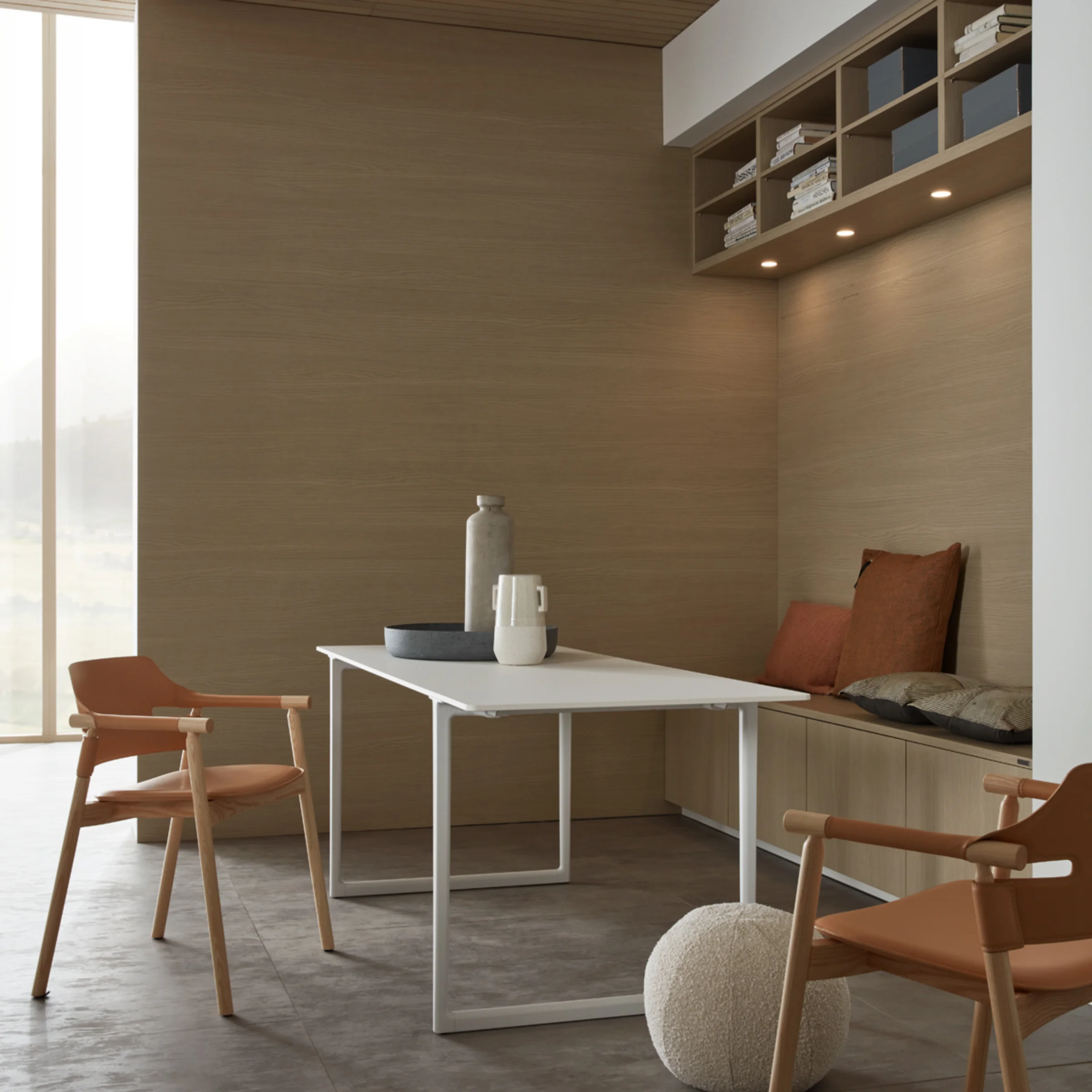 Un moderno soggiorno con dettagli in legno e mobili da seduta, parte di Nolte Living.