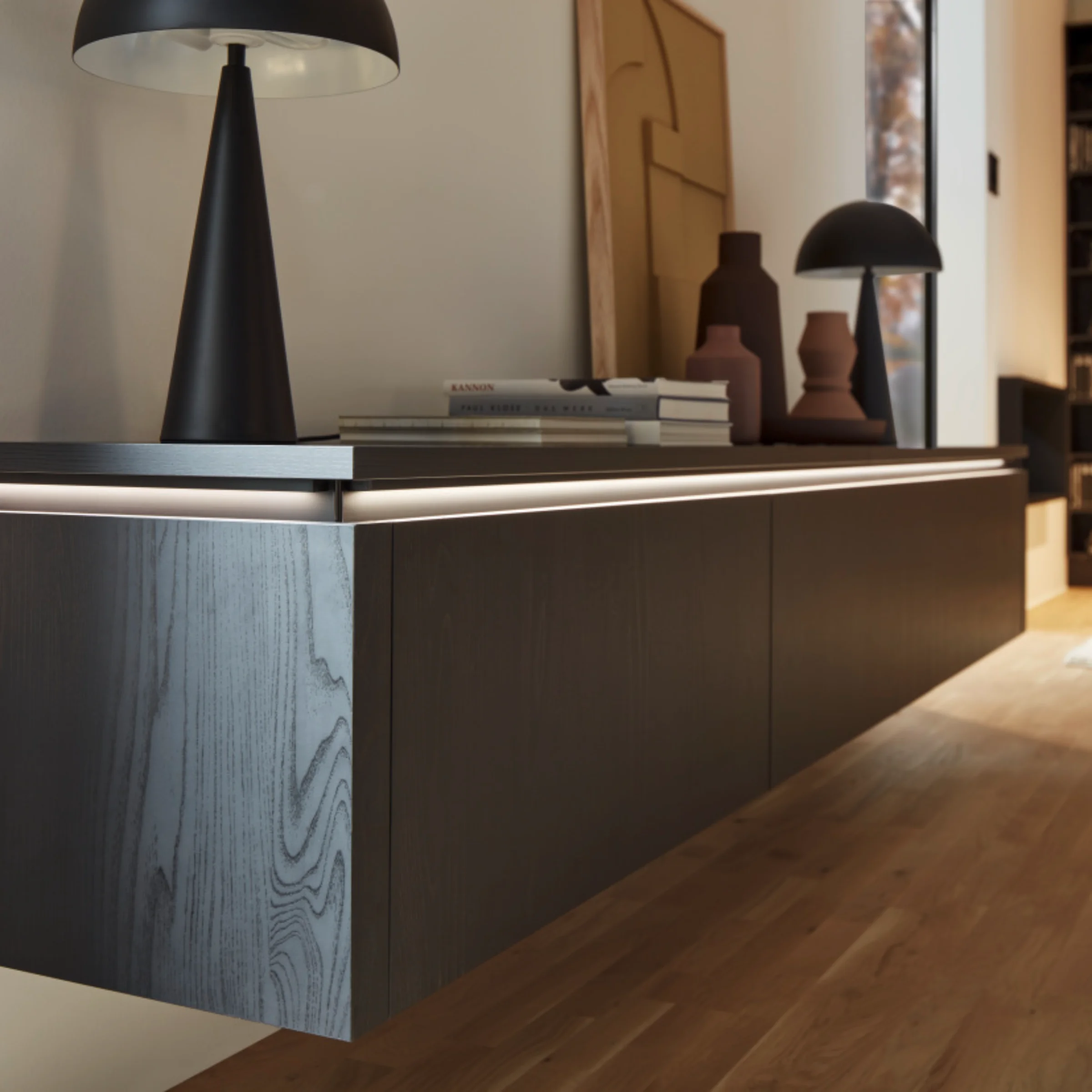 Soggiorno moderno con mobile sospeso e decorazioni eleganti, Nolte Living.
