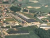 Edifici industriali Nolte in un'area rurale, circondati da campi e piccoli insediamenti.