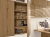 Cucina moderna con armadi in legno e scaffali aperti, progettata da Nolte Kitchen.